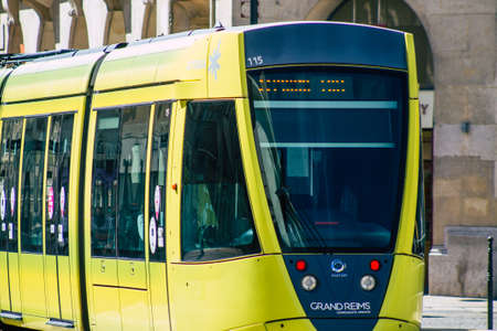 Reims France September 04, 2020 View of a modern electric tram for passengers driving through the streets and part of the public transport system of Reims, a city in the Grand Est region of Franceのeditorial素材