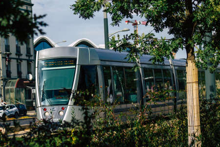 Reims France September 04, 2020 View of a modern electric tram for passengers driving through the streets and part of the public transport system of Reims, a city in the Grand Est region of Franceのeditorial素材