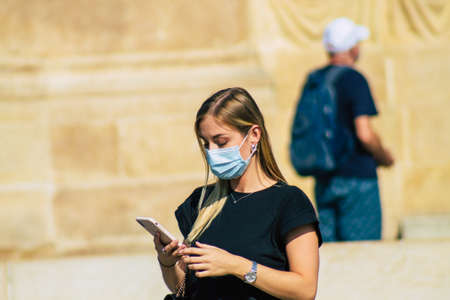 Reims France September 12, 2020 View of unidentified pedestrians with a face mask to protect themself from the coronavirus walking in the streets of Reims, a city in the Grand Est region of Franceのeditorial素材
