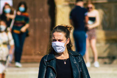 Reims France September 12, 2020 View of unidentified pedestrians with a face mask to protect themself from the coronavirus walking in the streets of Reims, a city in the Grand Est region of Franceのeditorial素材