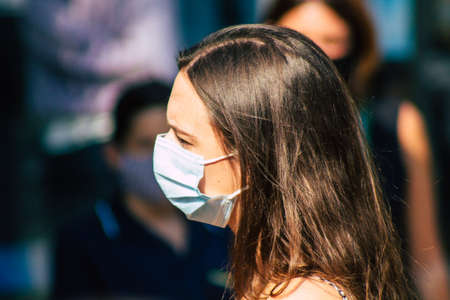 Reims France September 12, 2020 View of unidentified pedestrians with a face mask to protect themself from the coronavirus walking in the streets of Reims, a city in the Grand Est region of Franceのeditorial素材