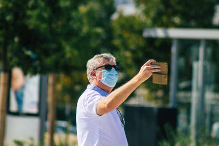 Reims France September 12, 2020 View of unidentified tourists visiting and walking in the streets of Reims despite the Coronavirus pandemic affecting Franceのeditorial素材