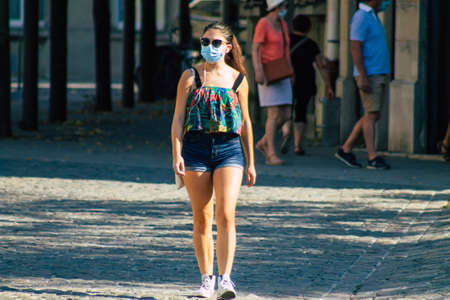 Reims France September 15, 2020 View of unidentified pedestrians with a face mask to protect themself from the coronavirus walking in the streets of Reims, a city in the Grand Est region of Franceのeditorial素材