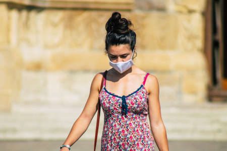 Reims France September 15, 2020 View of unidentified pedestrians with a face mask to protect themself from the coronavirus walking in the streets of Reims, a city in the Grand Est region of Franceのeditorial素材
