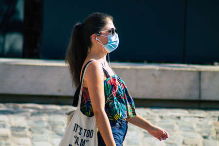 Reims France September 15, 2020 View of unidentified pedestrians with a face mask to protect...