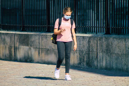 Reims France September 15, 2020 View of unidentified pedestrians with a face mask to protect...