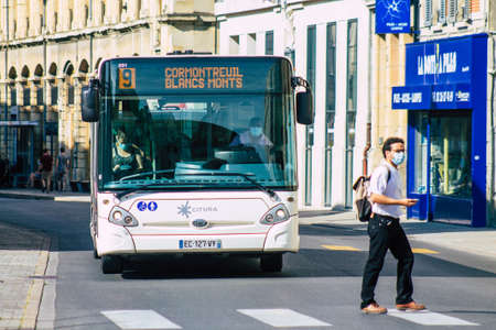 Reims France September 15, 2020 View of a traditional city bus for passengers driving through the streets and part of the public transport system of Reims, a city in the Grand Est region of Franceのeditorial素材