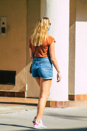 Reims France September 15, 2020 View of unidentified pedestrians with a face mask to protect themself from the coronavirus walking in the streets of Reims, a city in the Grand Est region of Franceのeditorial素材