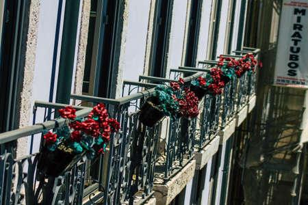 Lisbon Portugal july 28, 2020 View of classic facade of ancient historical buildings in the downtown area of Lisbon, the hilly coastal capital city of Portugal and one of the oldest cities in Europeのeditorial素材