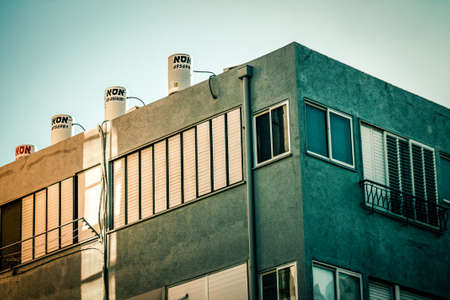 View of the facade of a modern building in the streets of Tel Aviv in Israelの写真素材