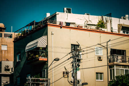 View of the facade of a modern building in the streets of Tel Aviv in Israelの写真素材