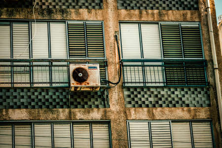 View of the facade of a modern building in the streets of Tel Aviv in Israelの写真素材