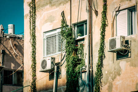 View of the facade of a modern building in the streets of Tel Aviv in Israelの写真素材