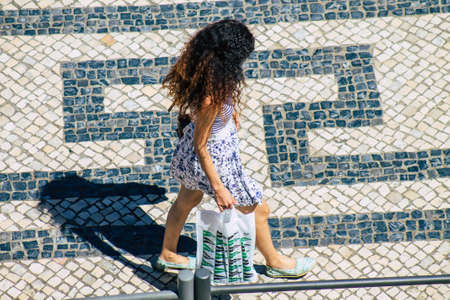Lisbon Portugal july 25, 2020 View of unidentified pedestrians walking in the streets of the downtown area of Lisbon, the hilly coastal capital city of Portugal and one of the oldest cities in Europeのeditorial素材