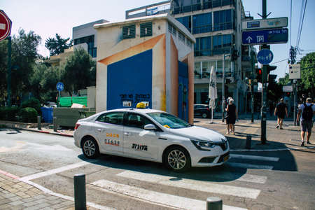 Tel Aviv Israel September 29, 2020 View of an traditional Israeli taxi driving through the empty...