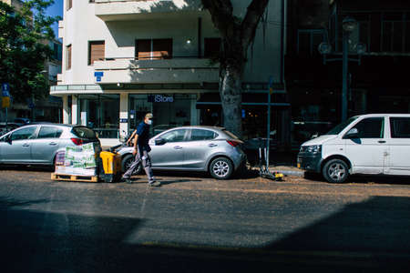 Tel Aviv Israel September 29, 2020 View of unidentified person delivering business during lockdown and coronavirus outbreak to protect the populationのeditorial素材