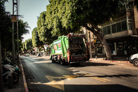 Tel Aviv Israel September 29, 2020 Closeup of a garbage truck rolling in the empty streets of Tel...