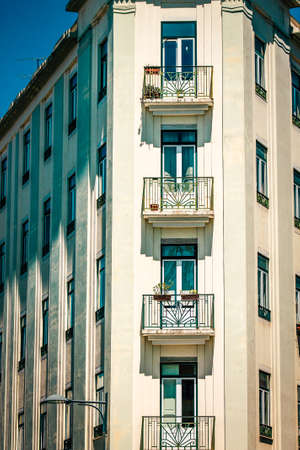 View of the facade of a building in the downtown of Lisbon in Portugalの写真素材