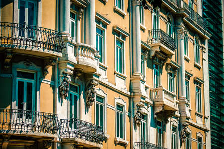 View of the facade of a building in the downtown of Lisbon in Portugalの写真素材