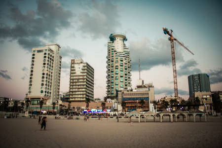 Tel Aviv Israel October 04, 2020 View of unidentified people without a face mask to protect themself having fun during the sunset in Tel Aviv beach despite lockdown and Coronavirus outbreakのeditorial素材