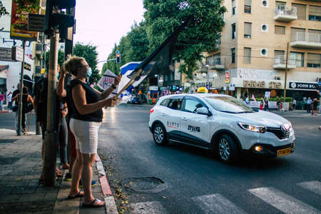 Tel Aviv Israel October 10, 2020 View of unidentified Israeli people demonstrating in the streets of Tel Aviv against the government s policies regarding the handling of the coronavirus epidemicのeditorial素材