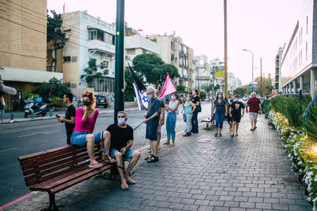 Tel Aviv Israel October 10, 2020 View of unidentified Israeli people demonstrating in the streets of Tel Aviv against the government s policies regarding the handling of the coronavirus epidemicのeditorial素材