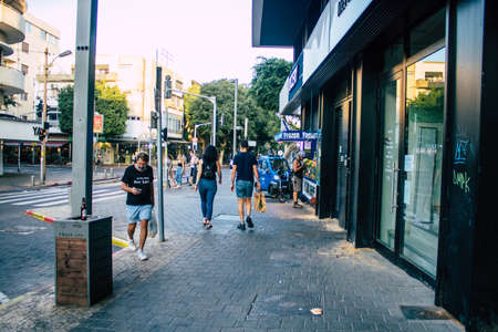 Tel Aviv Israel October 10, 2020 View of unidentified Israeli people walking in the empty streets of Tel Aviv during the Coronavirus outbreak and the lockdown to enforce containment of the populationのeditorial素材