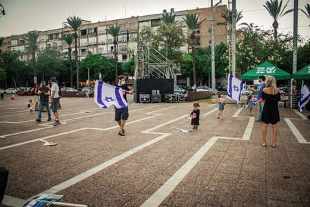 Tel Aviv Israel October 17, 2020 Unidentified people participating in a protest against government policy in Rabin Square opposite Tel Aviv City Hall despite the coronavirus outbreak and lockdownのeditorial素材
