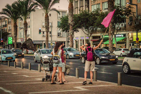 Tel Aviv Israel October 17, 2020 Unidentified people participating in a protest against government policy in Rabin Square opposite Tel Aviv City Hall despite the coronavirus outbreak and lockdownのeditorial素材