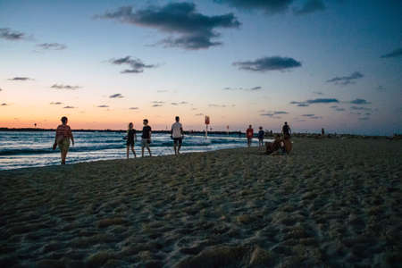 Tel Aviv Israel October 11, 2020 View of unidentified Israeli people having fun during the sunset in Tel Aviv beach despite lockdown and Coronavirus outbreakのeditorial素材