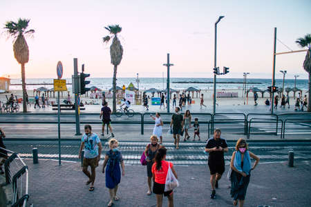 Tel Aviv Israel October 11, 2020 View of unidentified Israeli people walking in the streets of Tel Aviv during the Coronavirus outbreak and the lockdown to enforce containment of the populationのeditorial素材