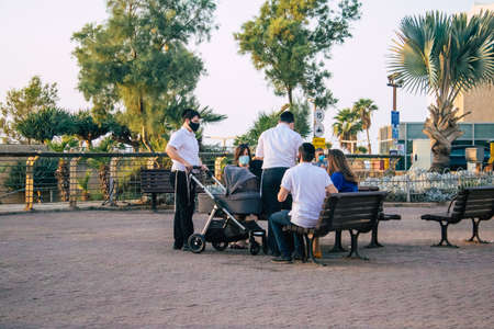 Tel Aviv Israel October 27, 2020 View of unidentified Israeli people sitting in the streets of Tel Aviv during lockdown and Coronavirus outbreak to enforce containment of the population in Israelのeditorial素材