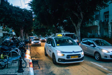 Tel Aviv Israel October 27, 2020 View of an traditional Israeli taxi driving through the empty...