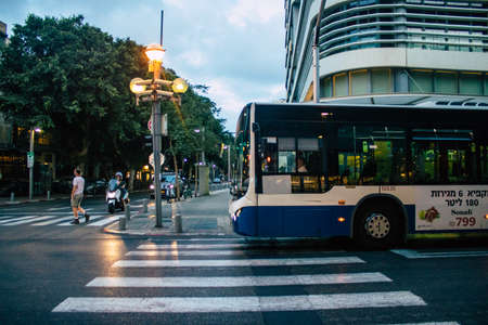 Tel Aviv Israel October 27, 2020 View of an Israeli public bus driving through the empty streets of Tel Aviv during the lockdown and Coronavirus outbreak to enforce containment of the populationのeditorial素材