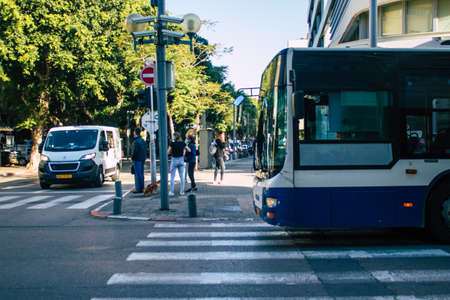 Tel Aviv Israel December 01, 2020 View of an Israeli public bus driving through the streets of Tel Aviv during the lockdown and Coronavirus outbreak in Israelのeditorial素材