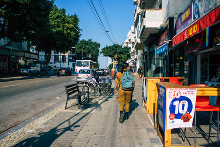 Tel Aviv Israel December 22, 2020 View of unidentified Israeli people walking in the streets of Tel Aviv during lockdown and Coronavirus outbreak hitting Israelのeditorial素材