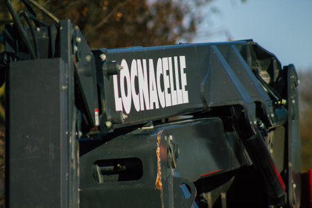 Reims France December 26, 2020 The Manitou tilting boom lift is equipped with a telescopic arm offering a positive and negative working area, it is particularly suitable for construction workのeditorial素材