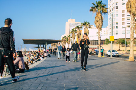 Tel Aviv Israel January 02, 2021 View of unidentified Israeli people walking on Herbert Samuel Promenade in Tel Aviv during lockdown and Coronavirus outbreak hitting Israelのeditorial素材