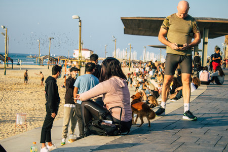 Tel Aviv Israel January 02, 2021 View of unidentified Israeli people walking on Herbert Samuel Promenade in Tel Aviv during lockdown and Coronavirus outbreak hitting Israelのeditorial素材