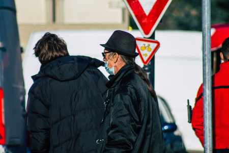 Reims France January 09, 2021 View of unidentified people with a face mask shopping at the market in downtown during Coronavirus outbreak and lockdown to enforce containment of the populationのeditorial素材