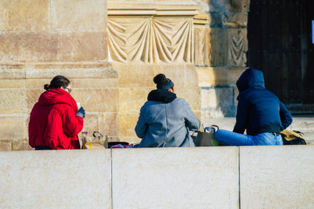 Reims France January 09, 2021 View of unidentified french people sitting in the streets of Reims to take a lunch because all the restaurants closed during the pandemic affecting Franceのeditorial素材