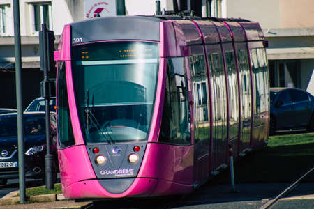Reims France February 14, 2021 Modern electric tram for passengers rolling in the streets of Reims during coronavirus pandemic and the lockdown to impose containment of the populationのeditorial素材