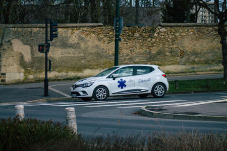 Reims France February 23, 2021 Ambulance driving through the streets of Reims during the coronavirus...