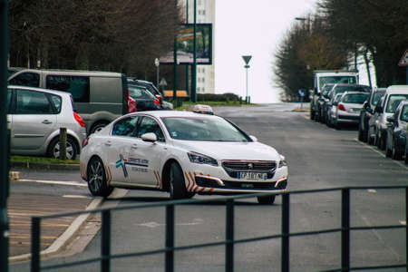 Reims France February 23, 2021 Taxi for passengers rolling in the streets of Reims during the coronavirus pandemic affecting Franceのeditorial素材
