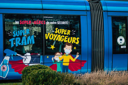 Reims France February 23, 2021 Modern electric tram for passengers rolling through the streets of Reims during the coronavirus outbreak hitting Franceのeditorial素材