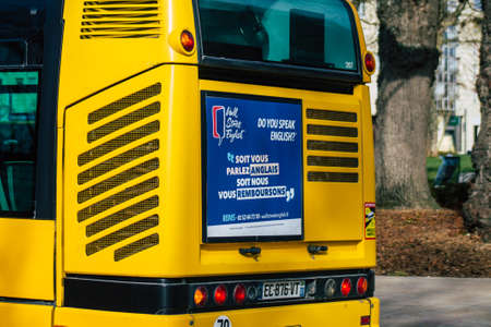 Reims France February 20, 2021 City bus for passengers driving through the streets during...