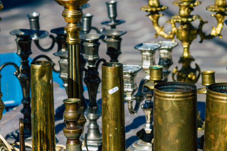 Old decorative objects sold at the flea market in downtown during the Coronavirus outbreak hitting Franceの写真素材
