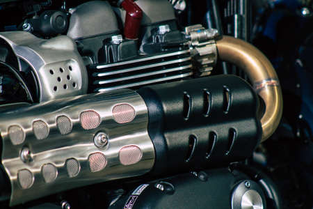 Closeup of a motorcycle parked in the streets of the city center of the metropolitan area