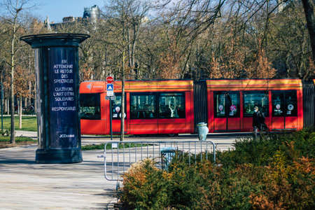 Reims France February 27, 2021 Modern electric tram for passengers rolling through the streets of...
