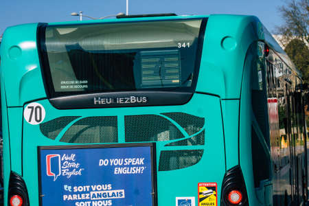 Reims France February 27, 2021 City bus for passengers driving through the streets during coronavirus outbreak hitting France and part of the public transport system of Reimsのeditorial素材